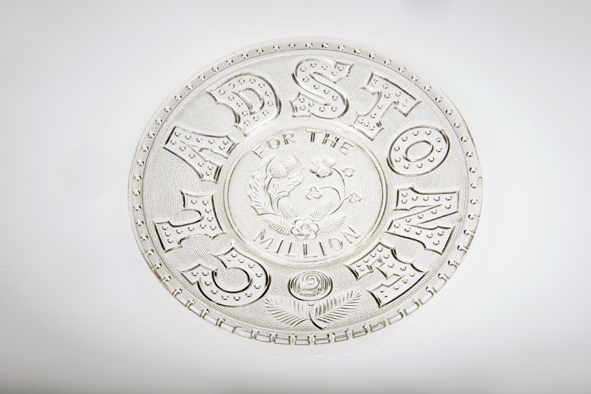 A HENRY GREENER, SUNDERLAND PRESSED GLASS "GLADSTONE FOR THE MILLION" PLATE. Diameter 24cm