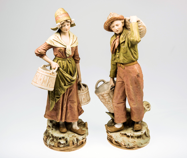 A PAIR OF LARGE ROYAL DUX (BOHEMIA) FIGURES OF A DUTCH FISHER BOY AND GIRL, he carrying baskets, she