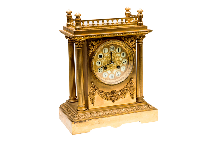 A FRENCH SECOND EMPIRE GILT METAL MANTLE CLOCK, of architectural form, the eight-day movement