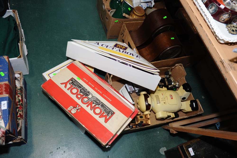 Two boxes inc. oak cased mantle clocks, vintage board games, retro robot toys etc