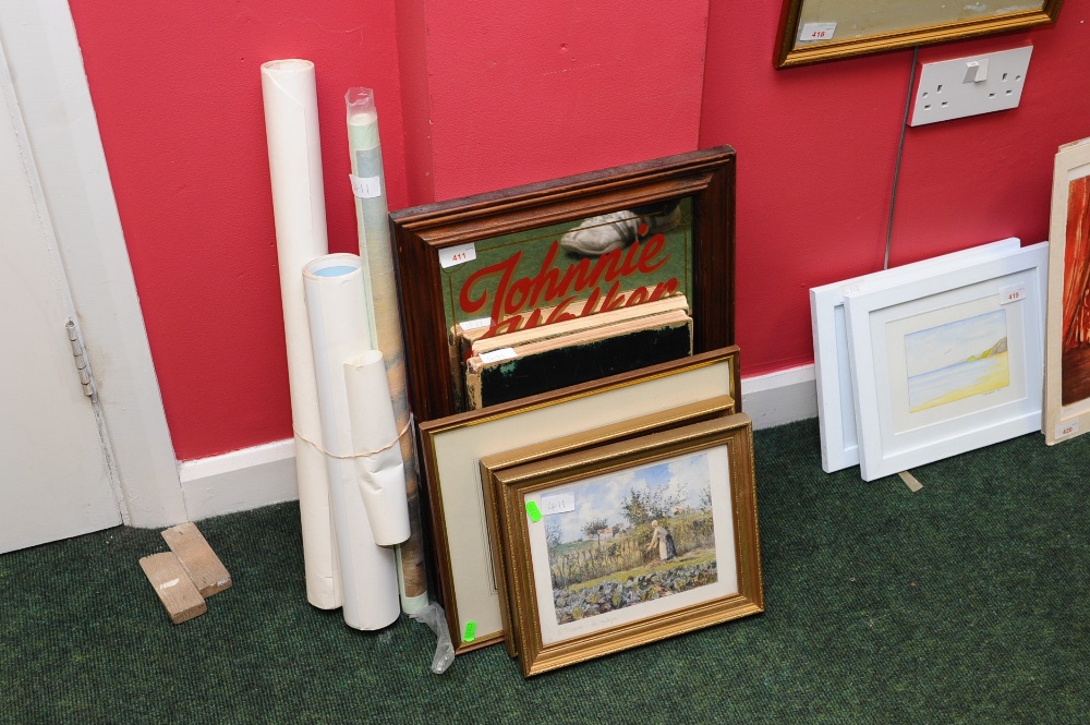 A group of framed prints, a Johnnie Walker advertising mirror and two volumes of sheet music