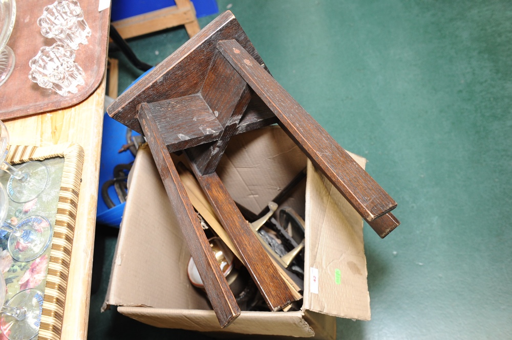 A box inc. an oak plant stand, two framed articles, brass trivet etc.