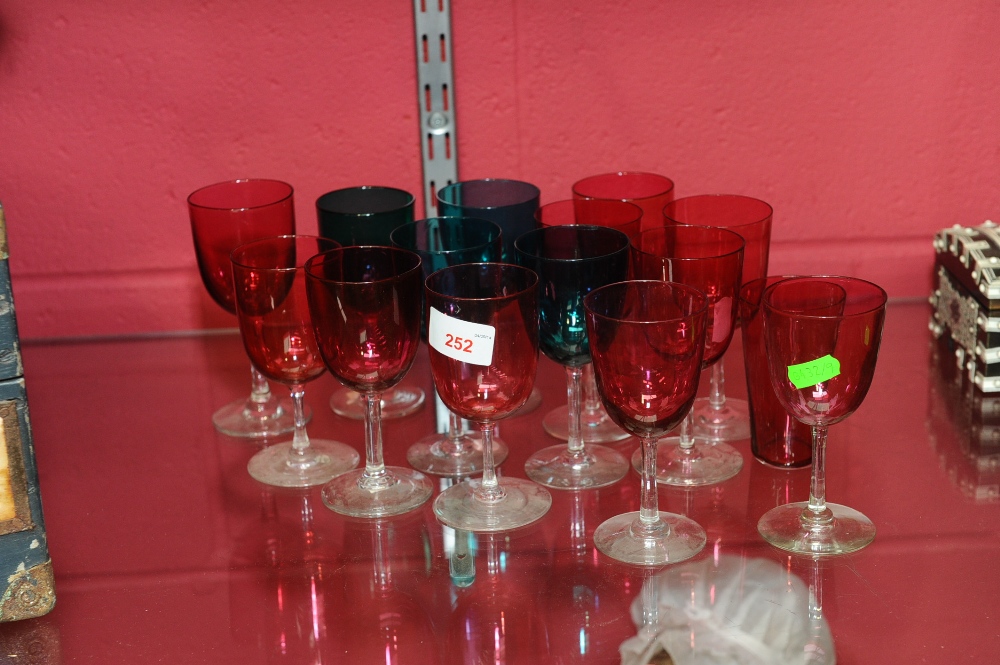 A group of coloured drinking glasses, cranberry and green, c.1900