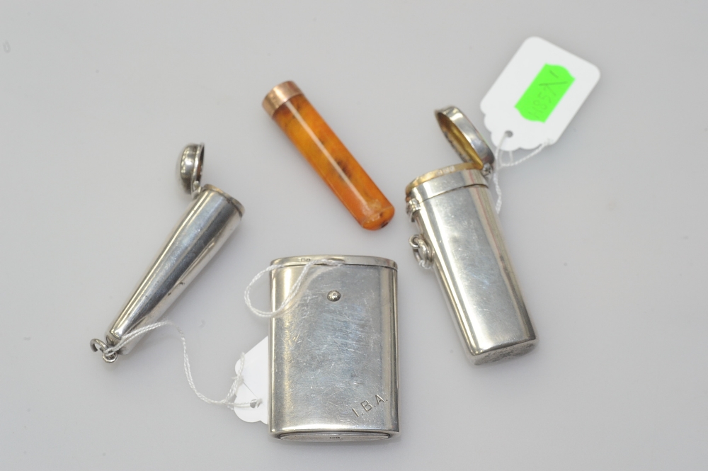 A George V silver cheroot case of tapered form with hinged lid inscribed Kate 1911 with an amber