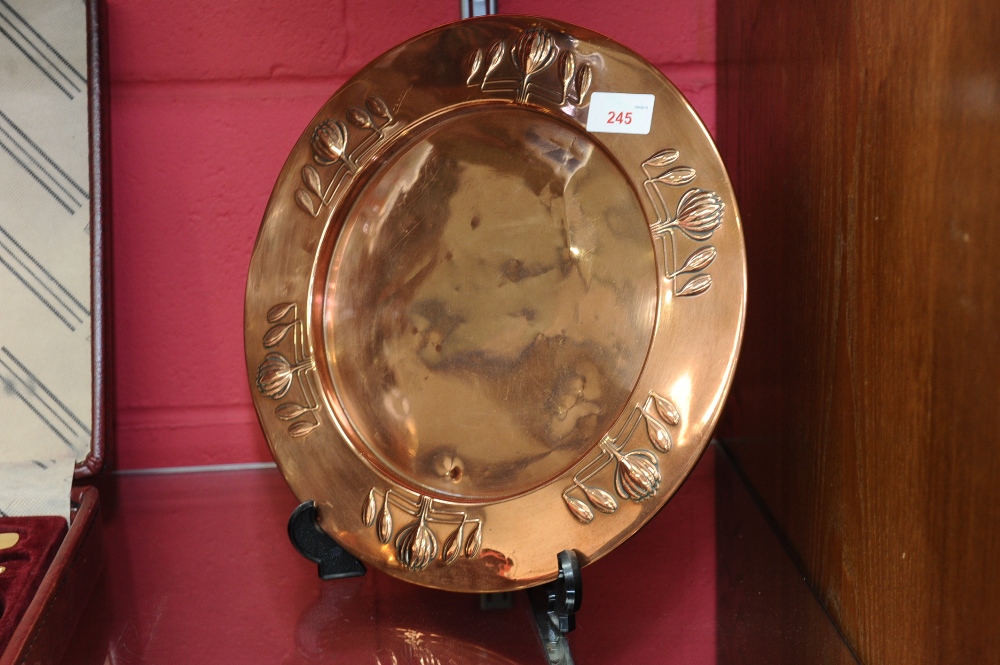 A Jugendstil copper charger by Carl Deffner