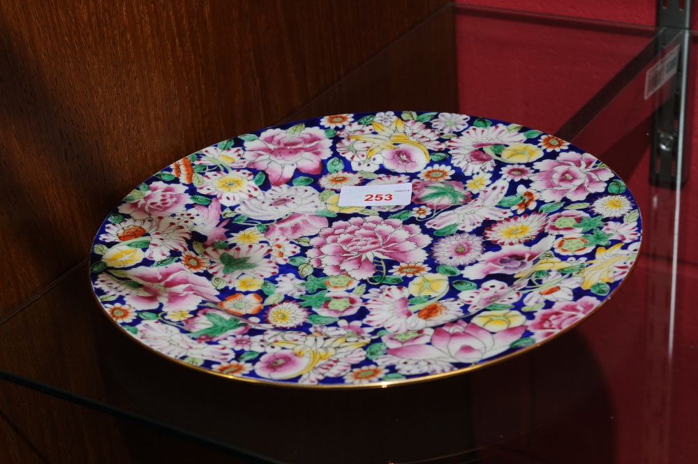 An early 20th centruy famille rose millefiori plate, decorated with chrysanthemums and with