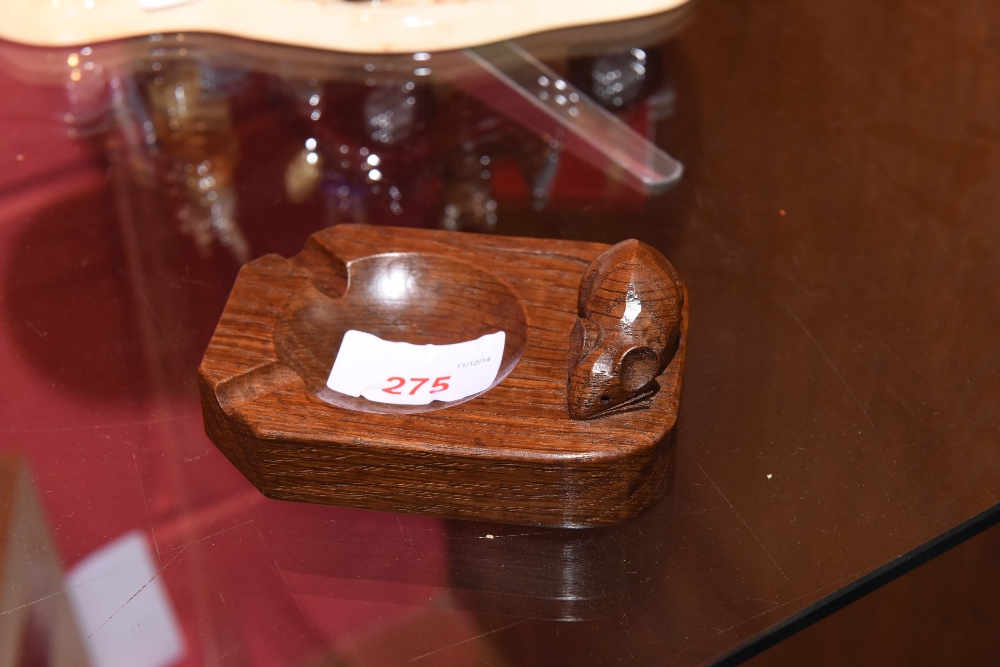 A Robert `Mouseman` Thompson oak ashtray with carved signature mouse