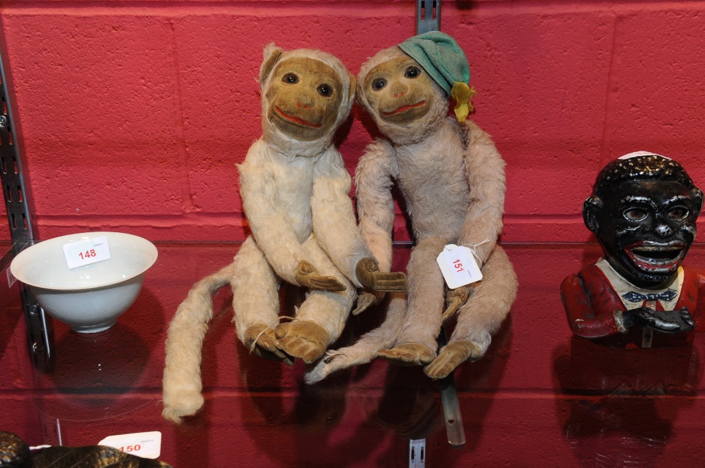Two 1930`s Norah Wellings monkeys, in plush and velvet, each with glass eyes, one with green felt