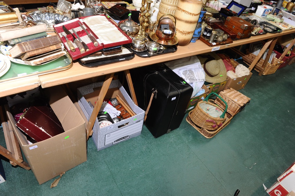 Five boxes including straw hats, fabrics, kitchenalia etc tog. with a  large suitcase and a wicker