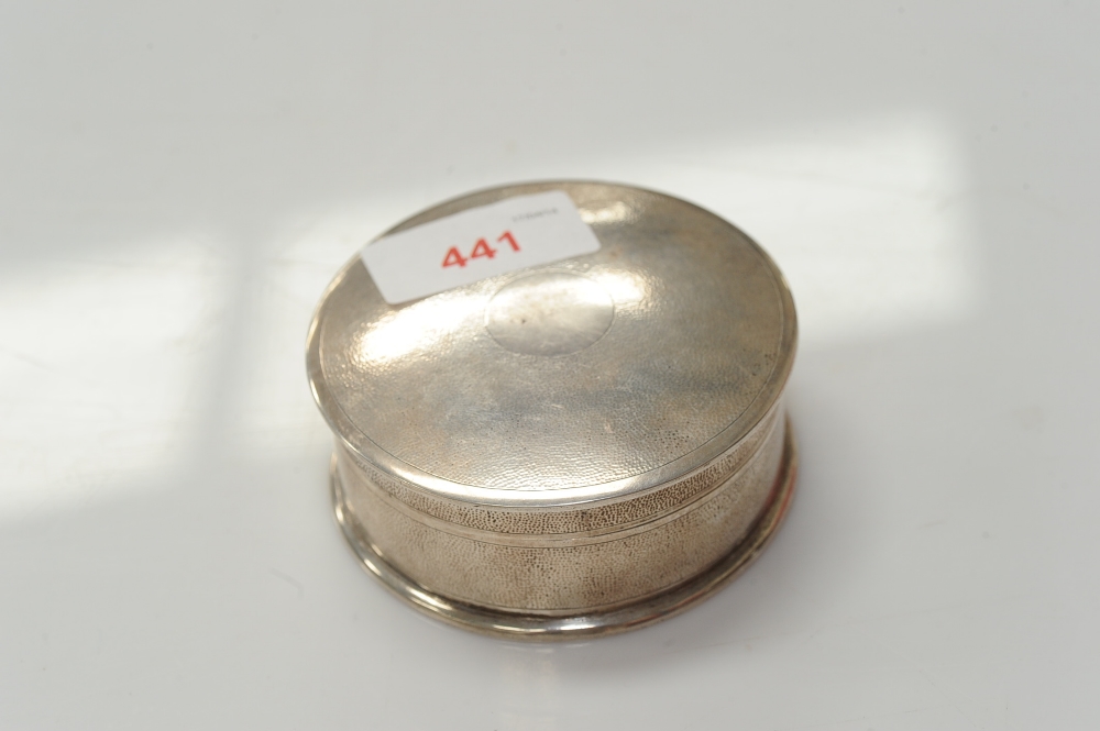 A Chinese silver circular covered box, bears Chinese character mark stamp and makers mark for Zeewo,