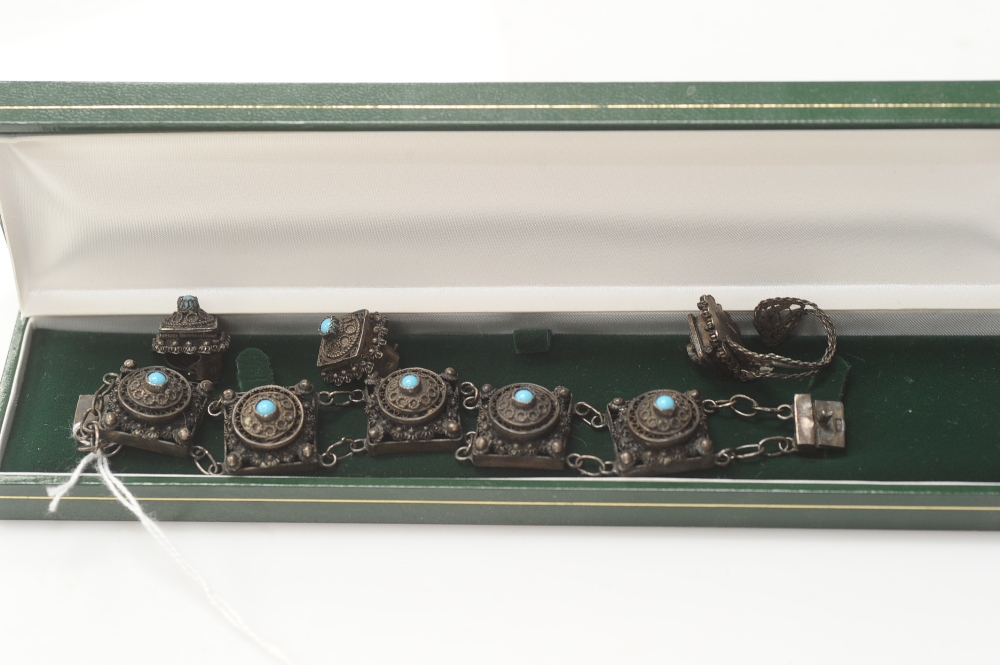 A suite of Indian silver jewellery mounted with turquoise beads.