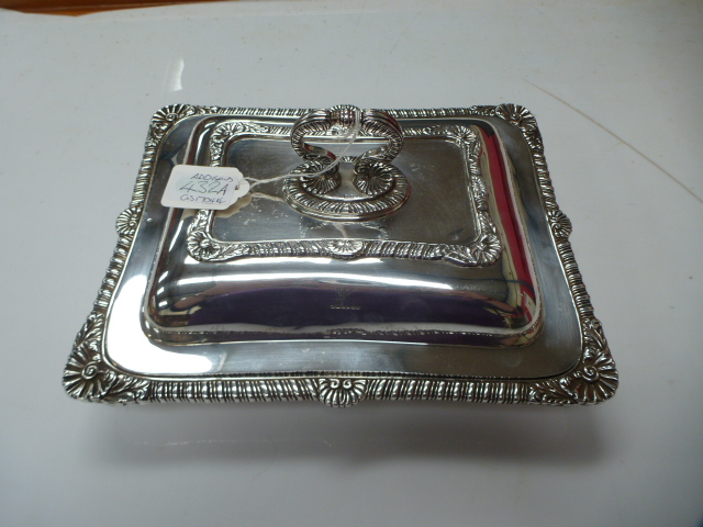 A George VI silver entree dish and cover, London 1938, with fluted and shell decoration, approx.