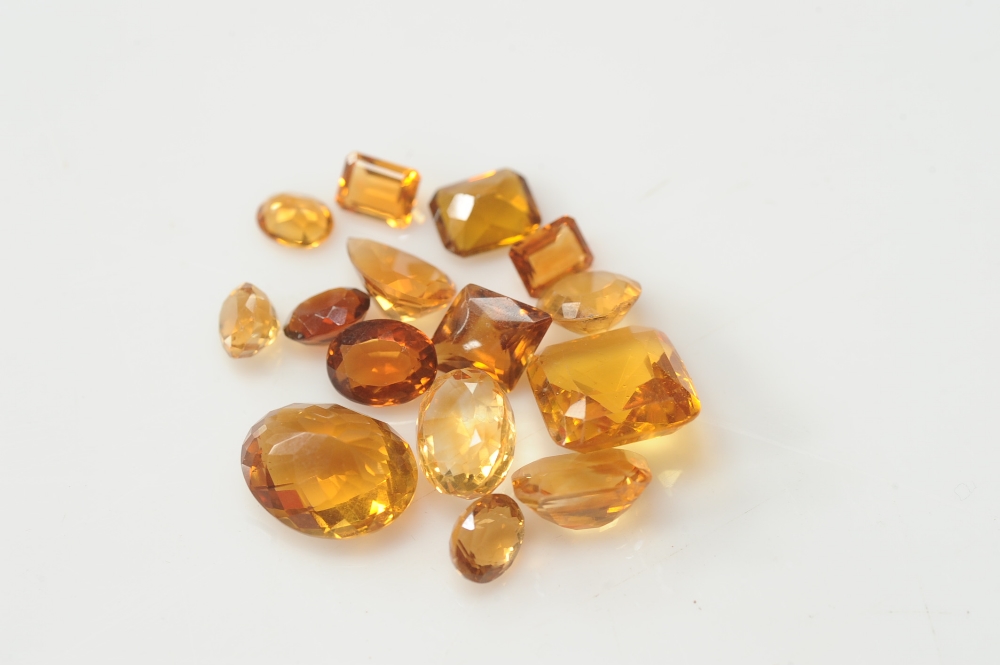 A selection of citrines, of various cuts including oval and emerald cut. Total weight 100 carats.