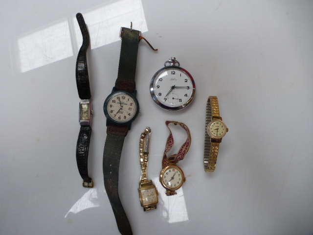 A Medana ladies wristwatch, a Sekonda ladies wristwatch, a stop watch and two further watches.