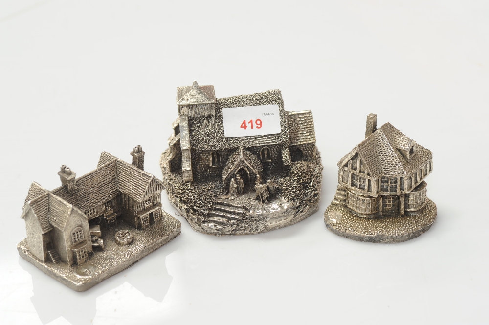 Three 20th Century silver models of a church and two houses, largest 12cm wide, marked for London