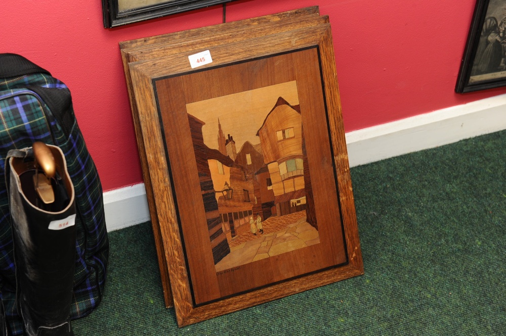 A set of four marquetry panels depicting English market towns.