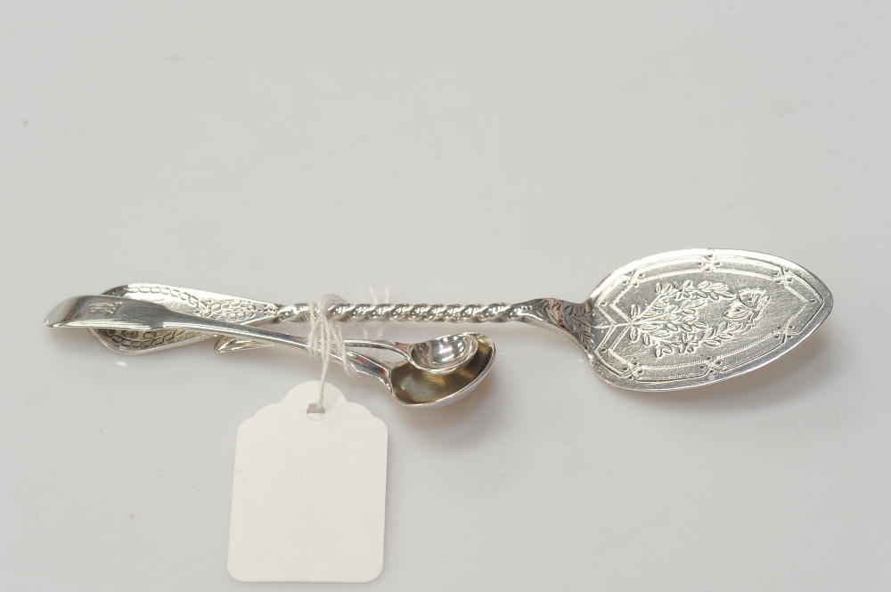 A silver butter slice,marked for  Newcastle 1882 together with a George 1V silver salt spoon, London