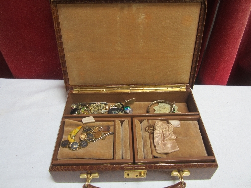 A MONOGRAMMED JEWELLERY CASE and a small quantity of costume jewellery.