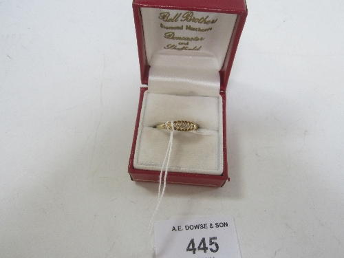 A FIVE STONE DIAMOND DRESS RING, yellow metal shank, marked 18ct.