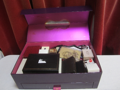 DRESS RINGS, necklaces and other costume jewellery, in a purple jewellery box.