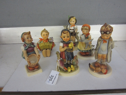 A HUMMEL FIGURE, girl with kittens, 12cm. and five others. (6)