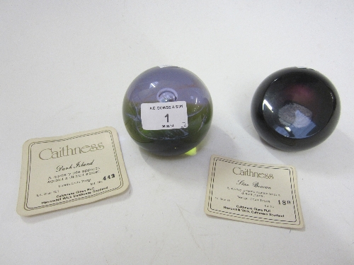 A CAITHNESS PAPERWEIGHT, Dark Island, limited edition, 8cm. and another Star Beacon. (2)