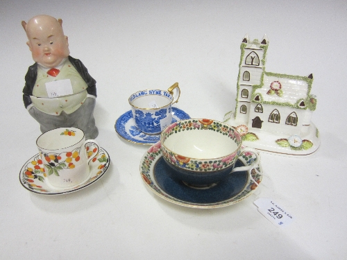 A COALPORT MODEL, Village Church, 15cm., a Continental pottery figure in two parts and three cups