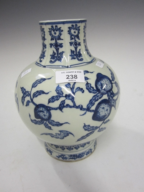 A CHINESE BLUE AND WHITE BULBOUS SHAPED VASE, bearing six character seal mark, decorated with