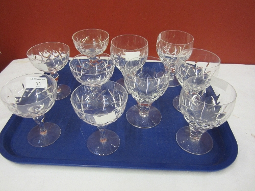 A SET OF FIVE CHAMPAGNE GLASSES, rounded bowls, baluster stems, 12cm. and five Brandy glasses en