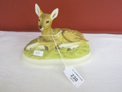 AN AYNSLEY BISQUE PORCELAIN MODEL, Roe Deer Fawn, width 17cm.