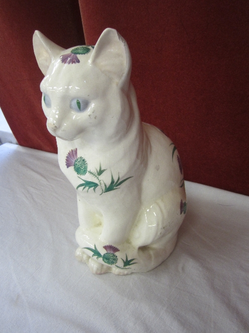 A PLICHTA WEMYSS WARE MODEL OF A CAT, painted decoration of thistles, 28cm.