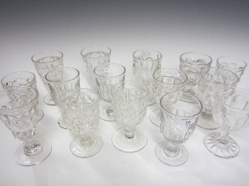 A COLLECTION OF VICTORIAN AND LATER MOULDED GLASS RUMMERS, 15cm. and smaller. (15)