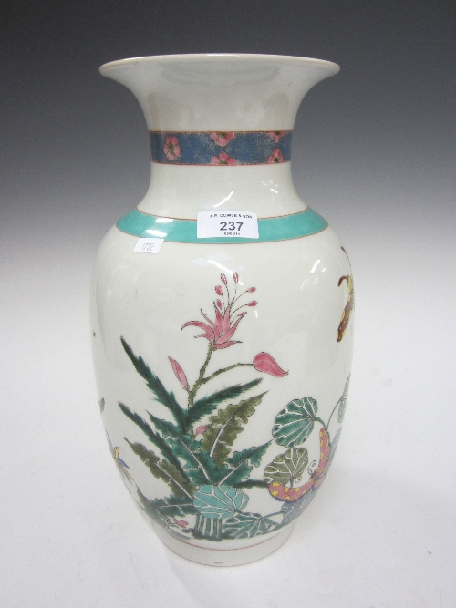 A LARGE CHINESE POLYCHROME VASE, ovoid bowl, six character mark, decorated with butterflies and