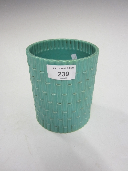 A CHINESE MONOCHROME VASE, bearing six character seal mark, turquoise glaze, bamboo outline, 14cm.