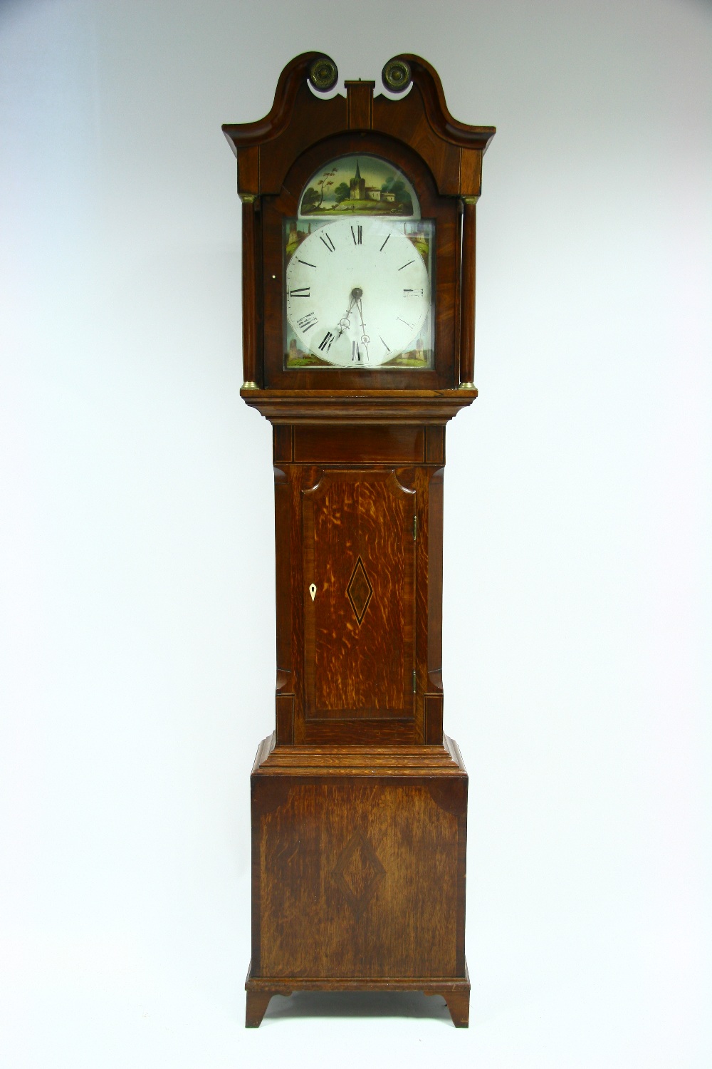 An early 19th century longcase clock, the 12"" painted arch dial with 30-hour striking movement, in