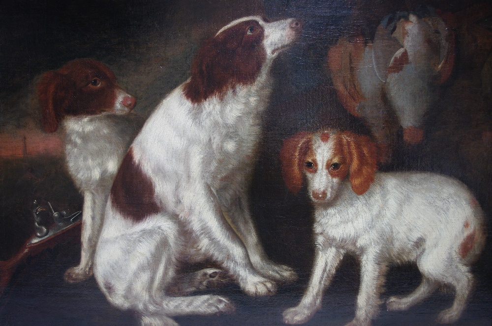 ENGLISH SCHOOL, early 19th century. A study of three springer spaniels, a brace of partridge