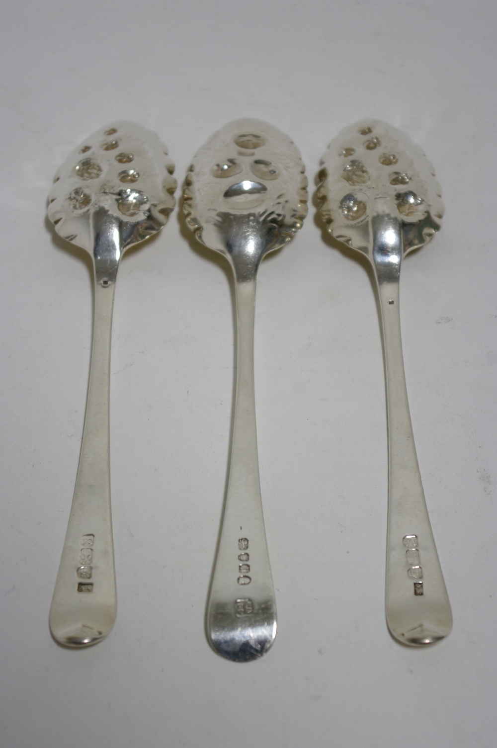 A pair of ?Berry? spoons, the George III Old English table spoons with later embossed, engraved, & - Image 2 of 2