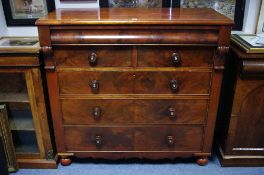 A Victorian mahogany chest fitted cushion-fronted frieze drawer above two short & three long