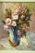 FRENCH SCHOOL, 20th century. A still life study of a vase of flowers. Signed indistinctly; oil on