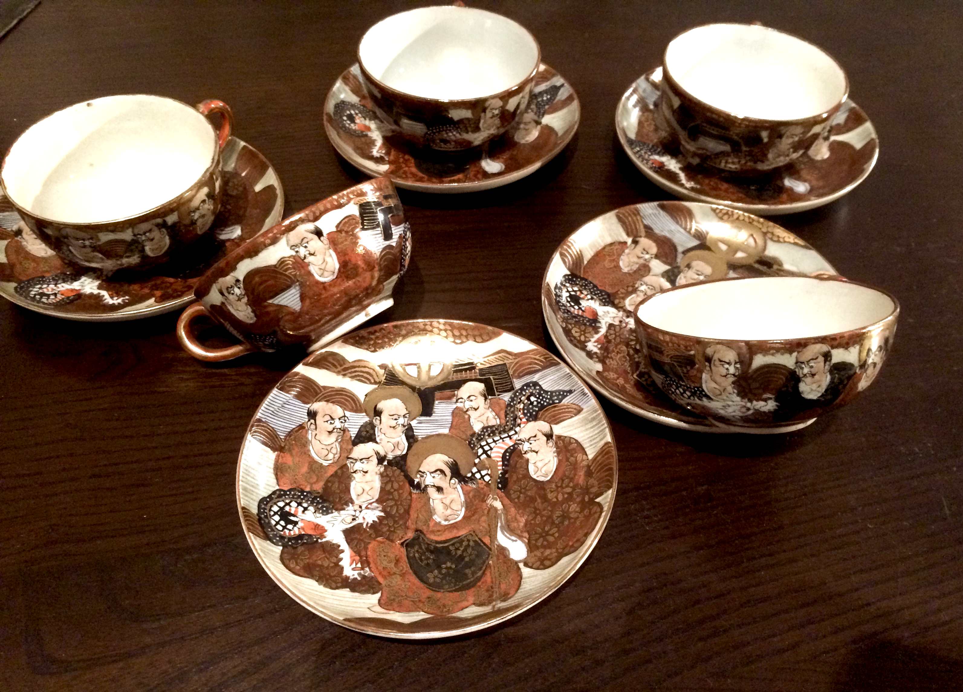 Set of 5 Japanese Shimazu cups and saucers. Meiji period.