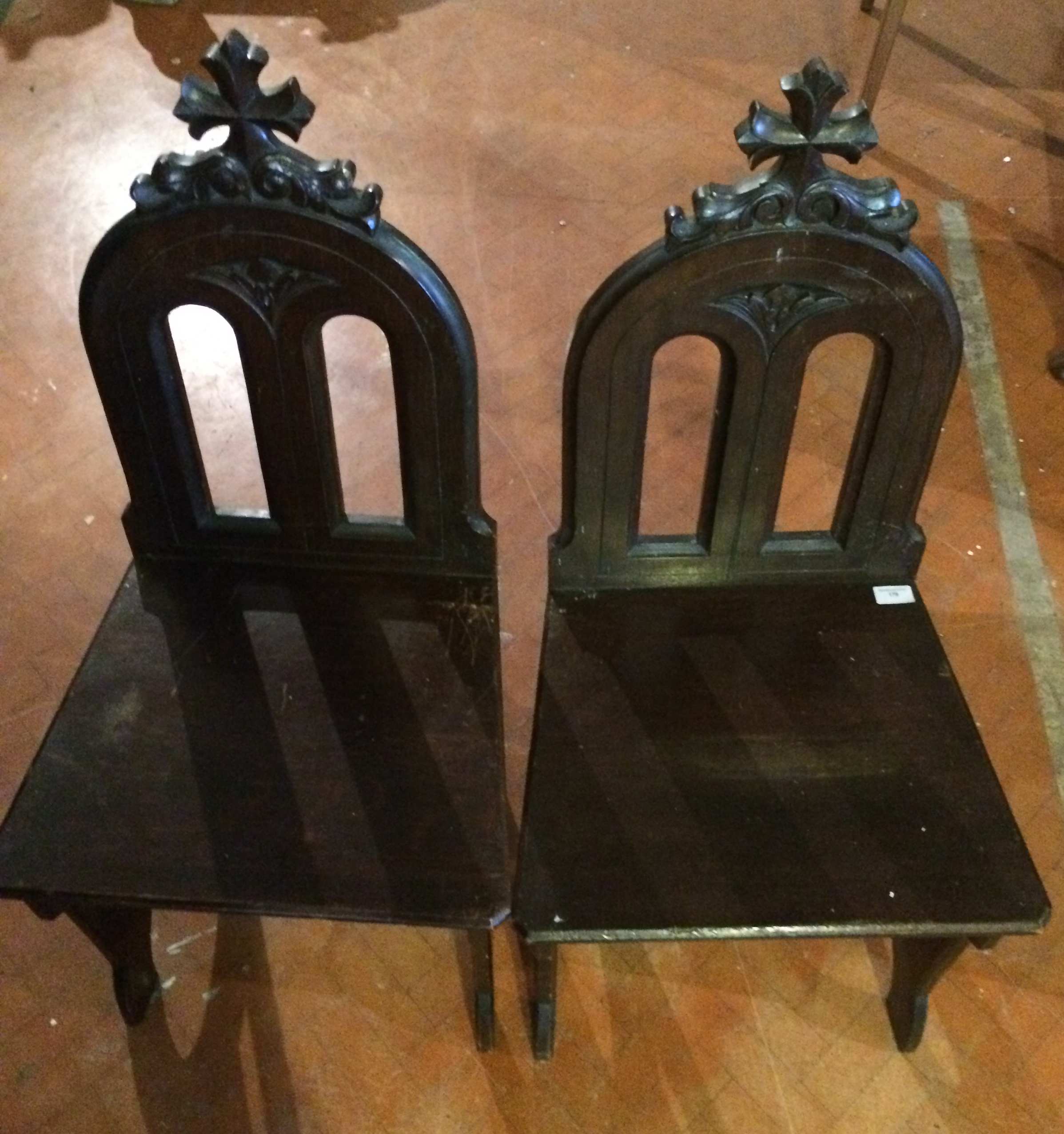 Pair of ecclesiastic design carved chairs