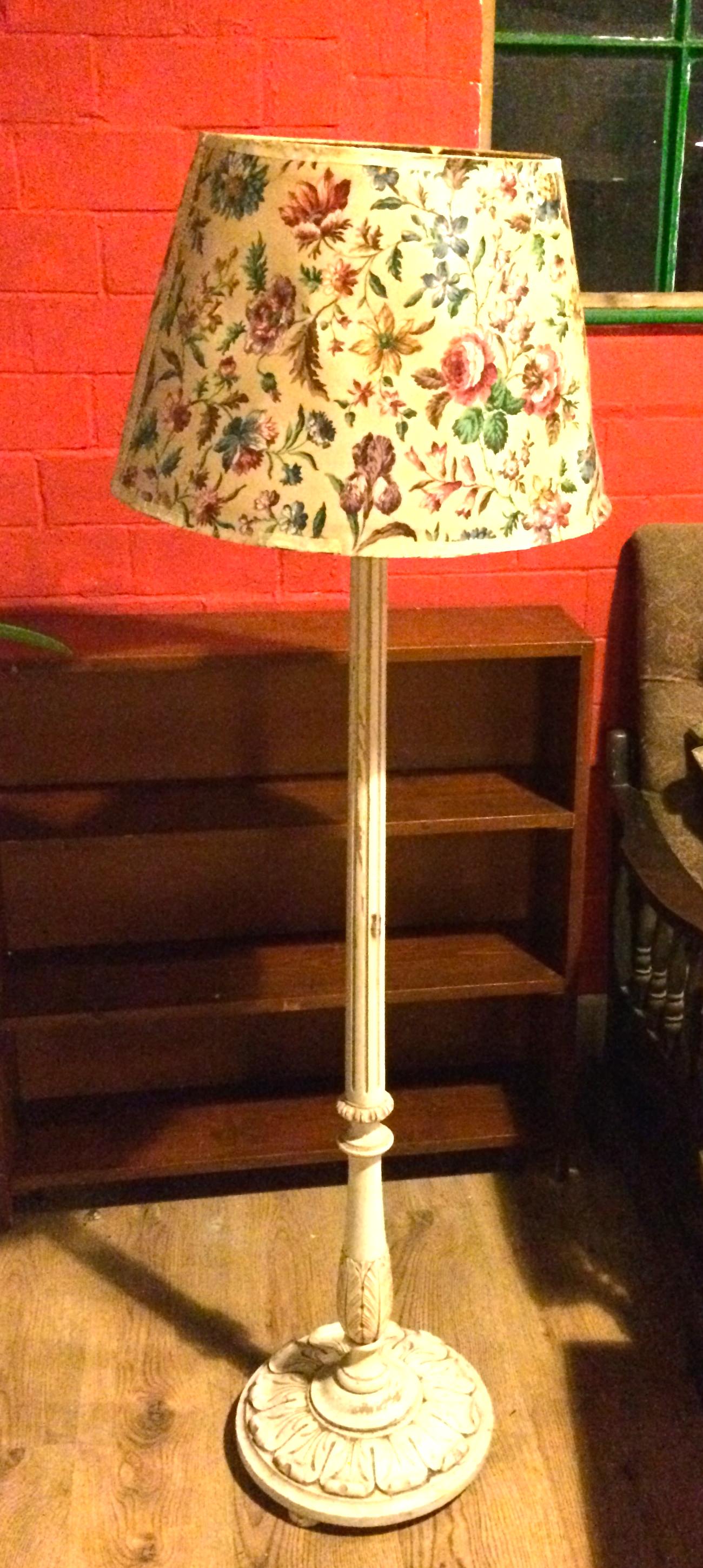 White painted standard lamp base with a mid 20thC decorative shade.
