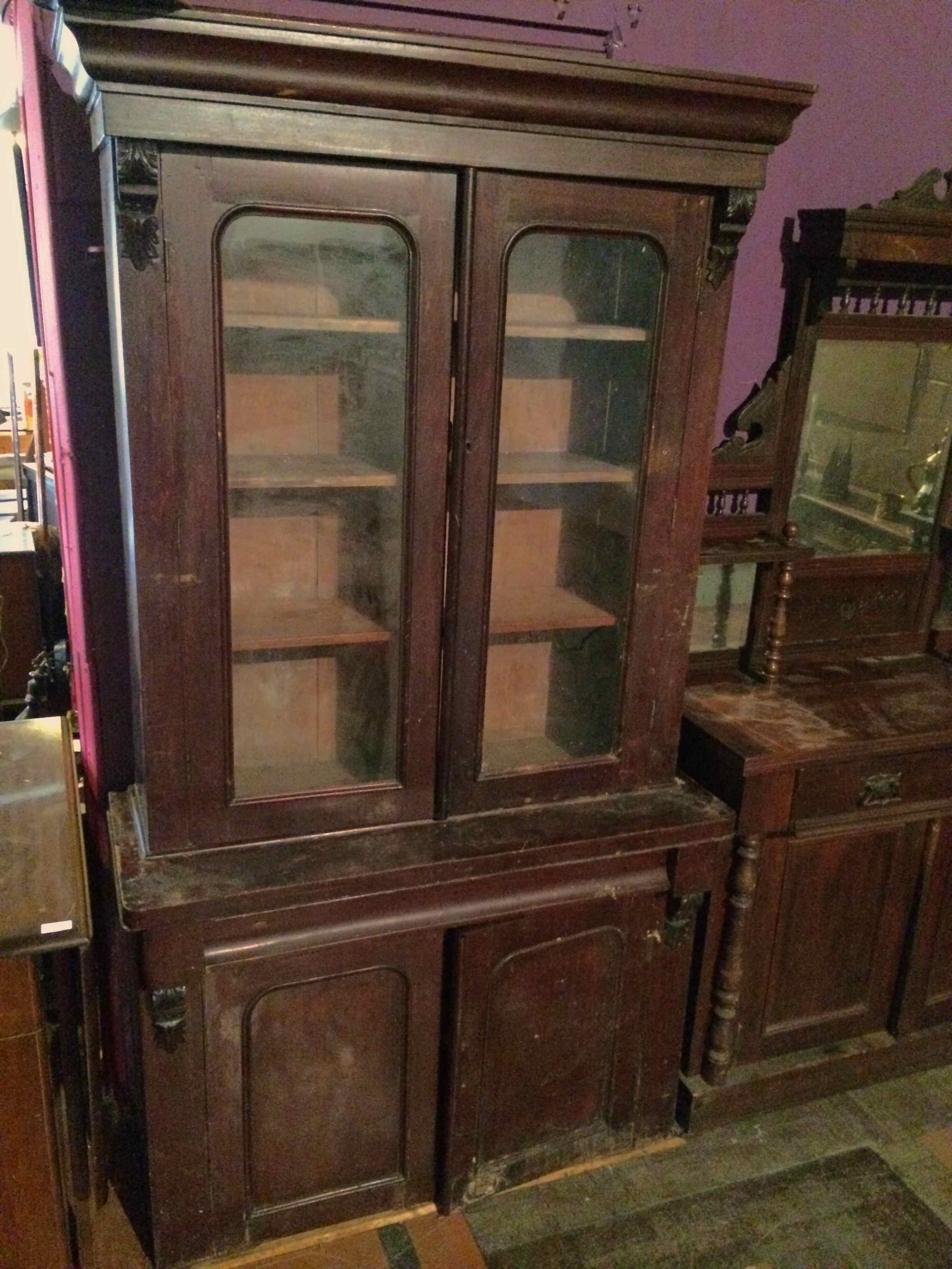 Victorian Apothecary cabinet with glass fronted shelf doors with cupboard base section. In 2 parts.