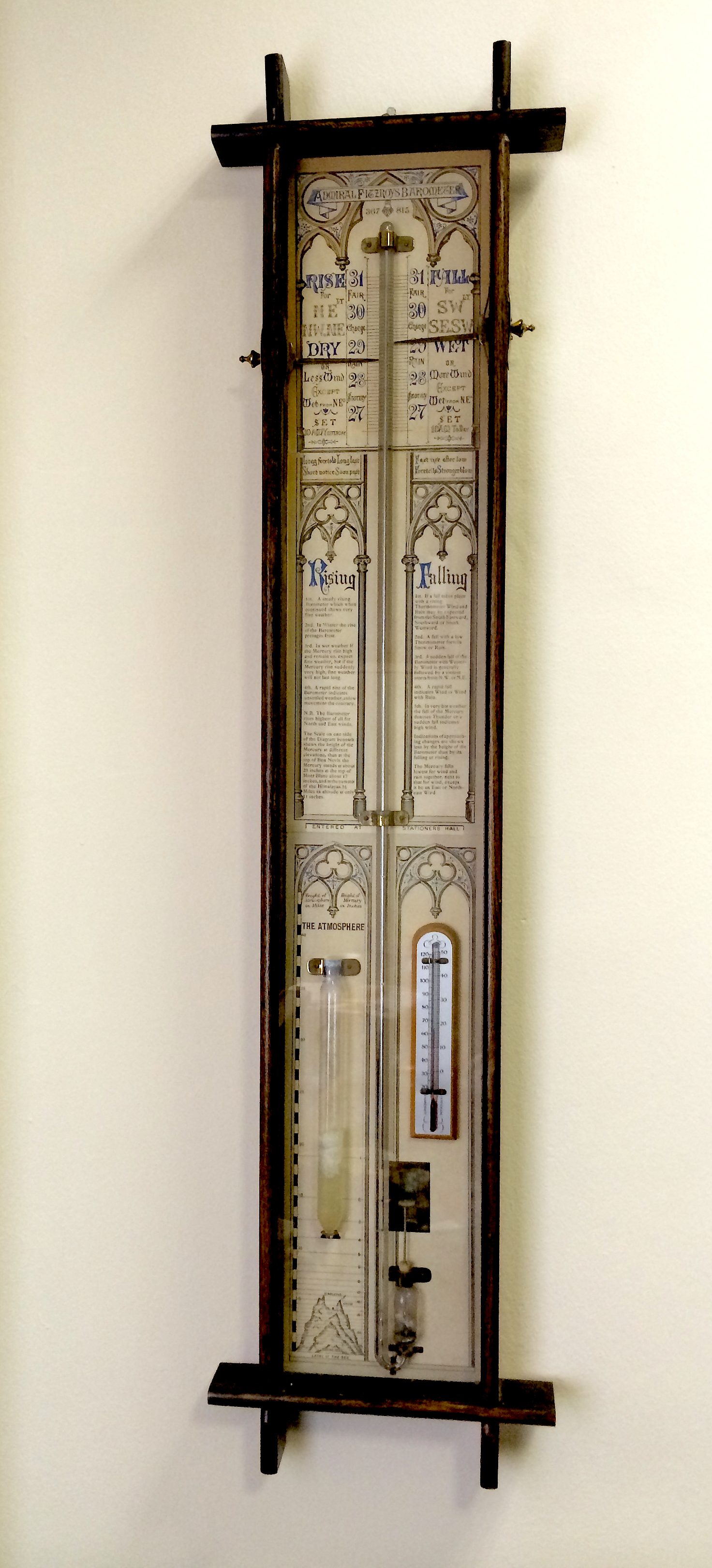 Glass fronted stick barometer titled Admiral Fitzroys Barometer 367 815. approx 110 x 20cm