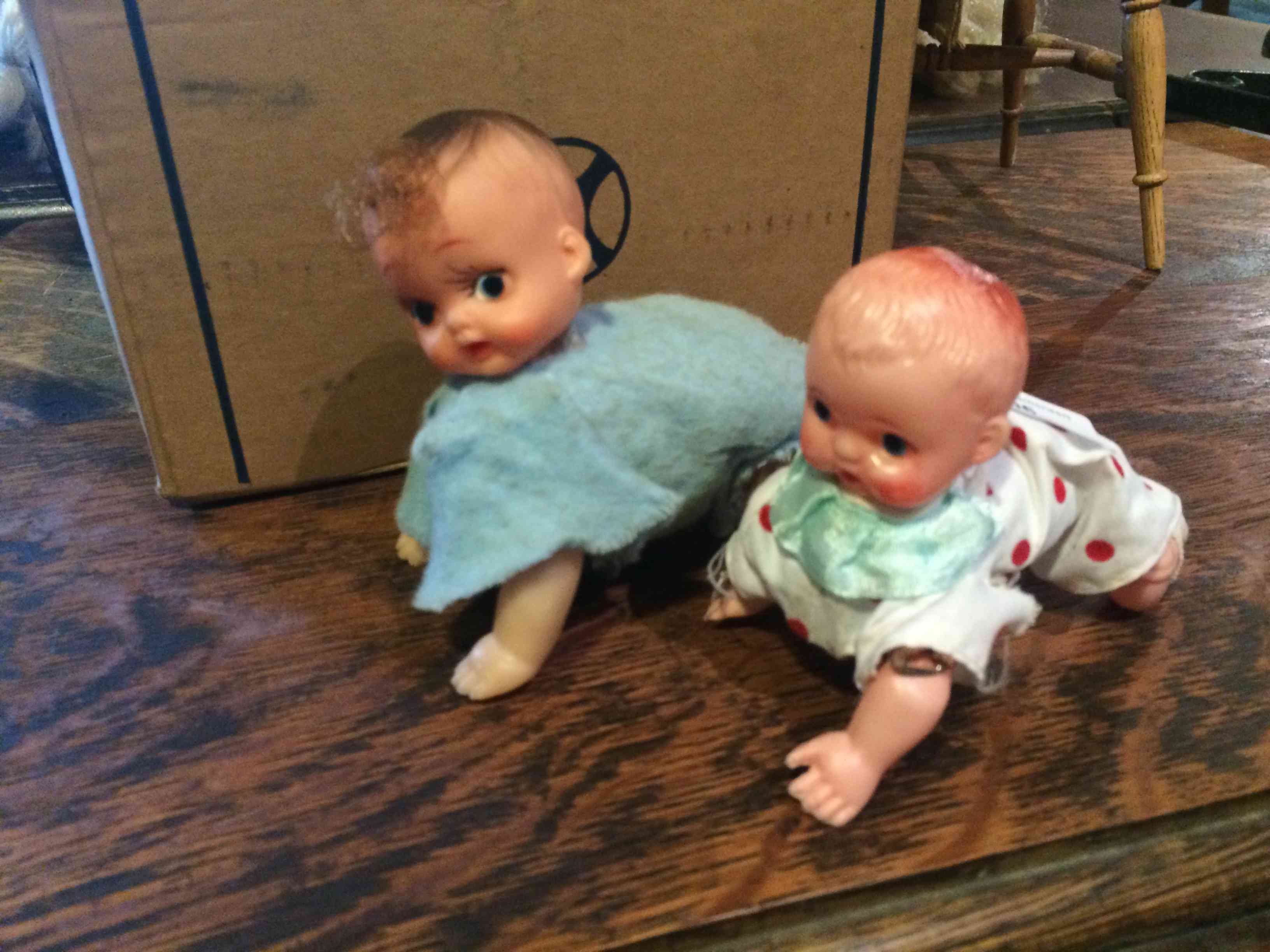 2 x Clockwork, Japanese, celluloid crawling baby toy. (2)