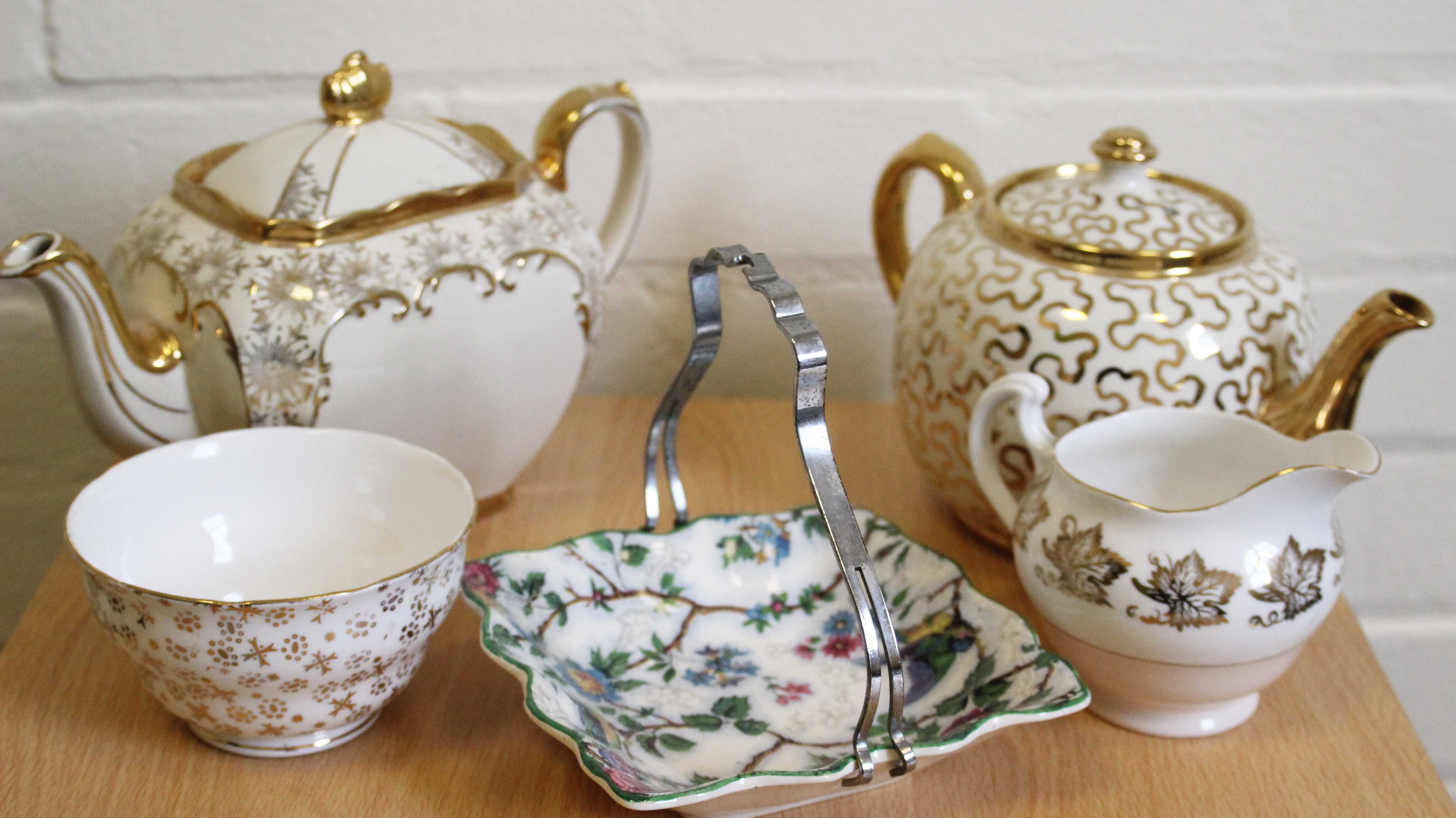 Tea Pots by Sadlers and Burslem, cups and metal handled Midwinter Dish.