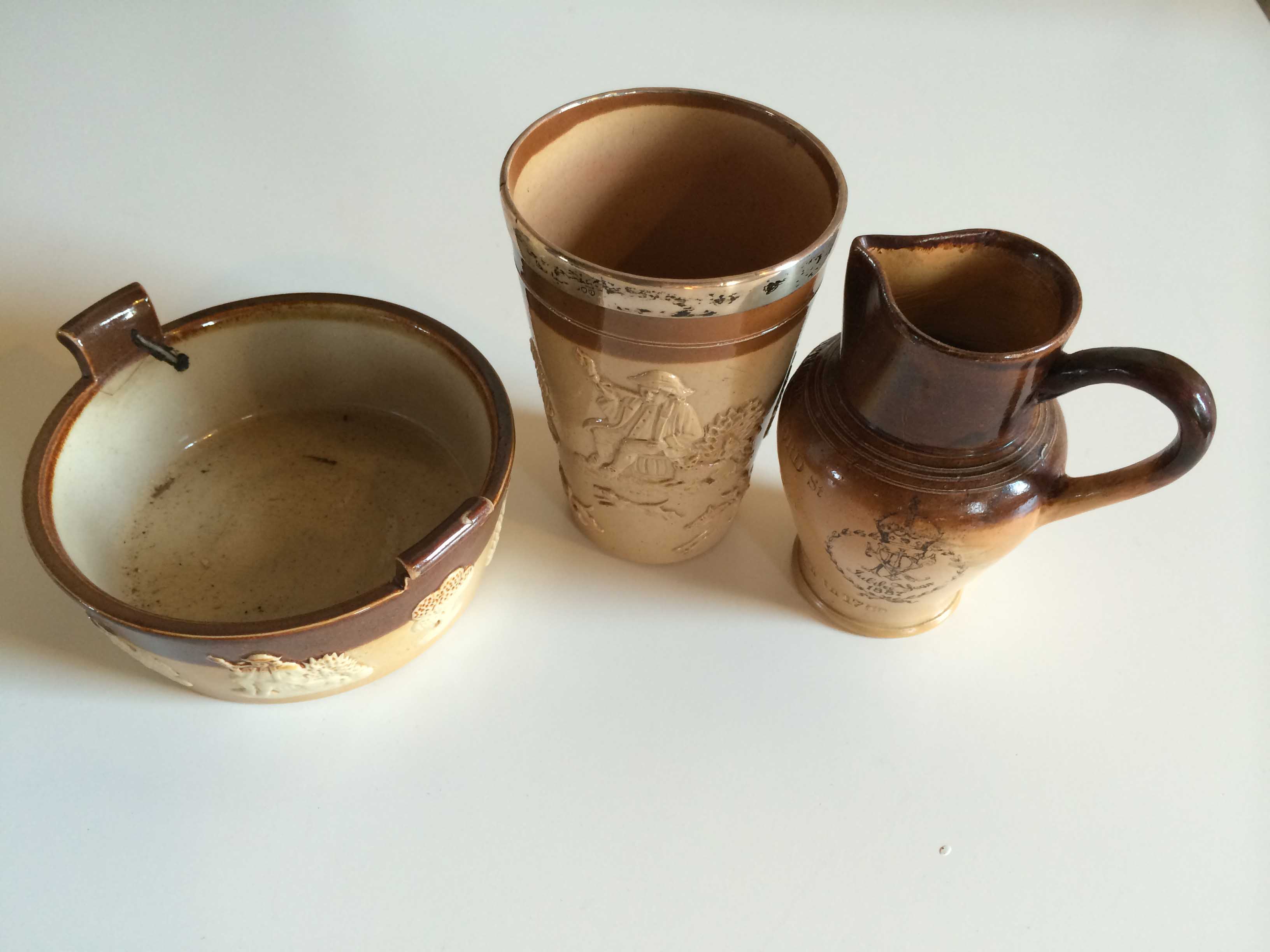 Turn of the century, hallmarked silver rimmed, Doulton Lambeth beaker. Plus Doulton Lambeth John