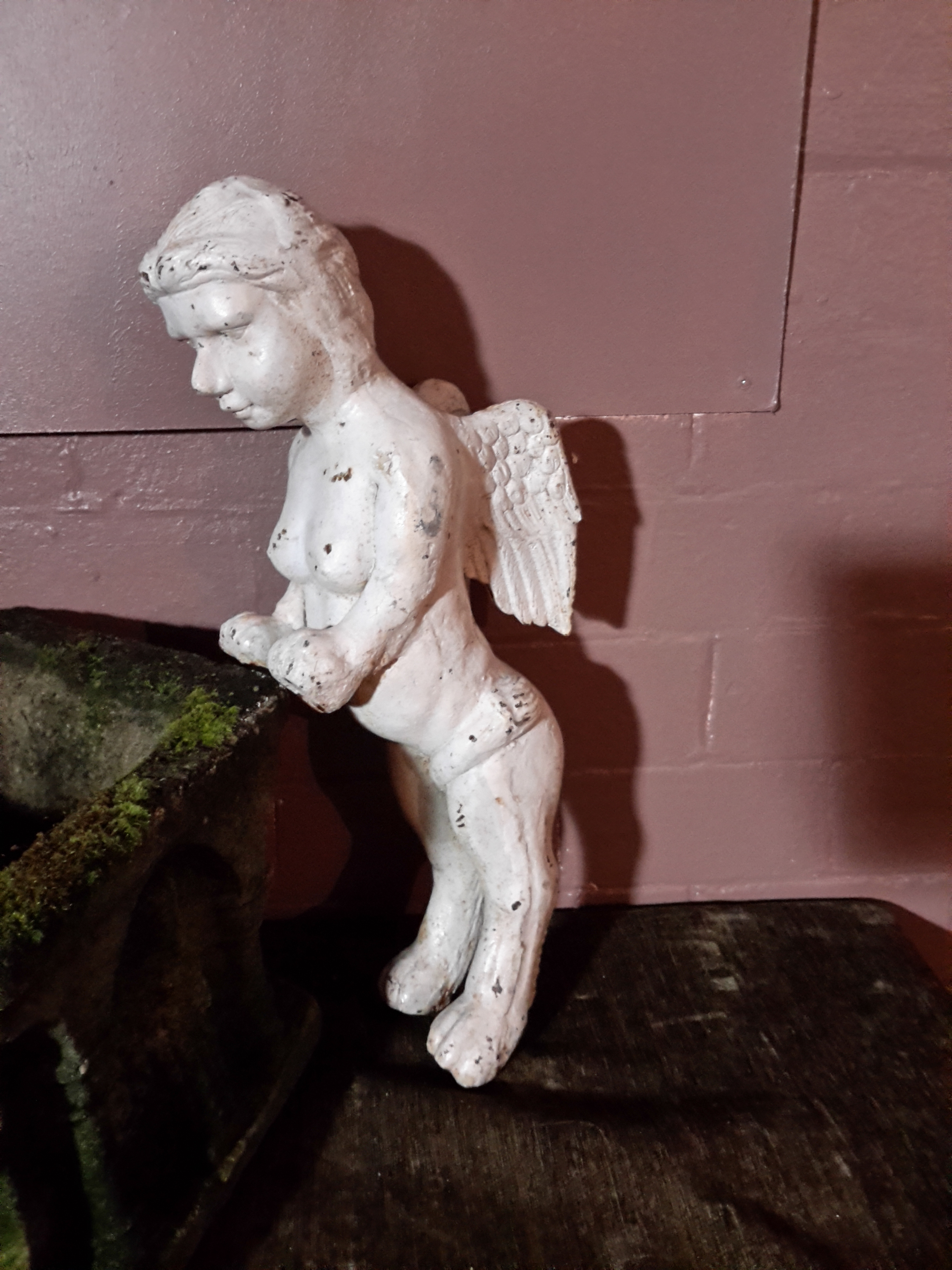 Pair of Victorian painted iron Putti. Winged with detailed form. condition: damage to the front - Image 2 of 3
