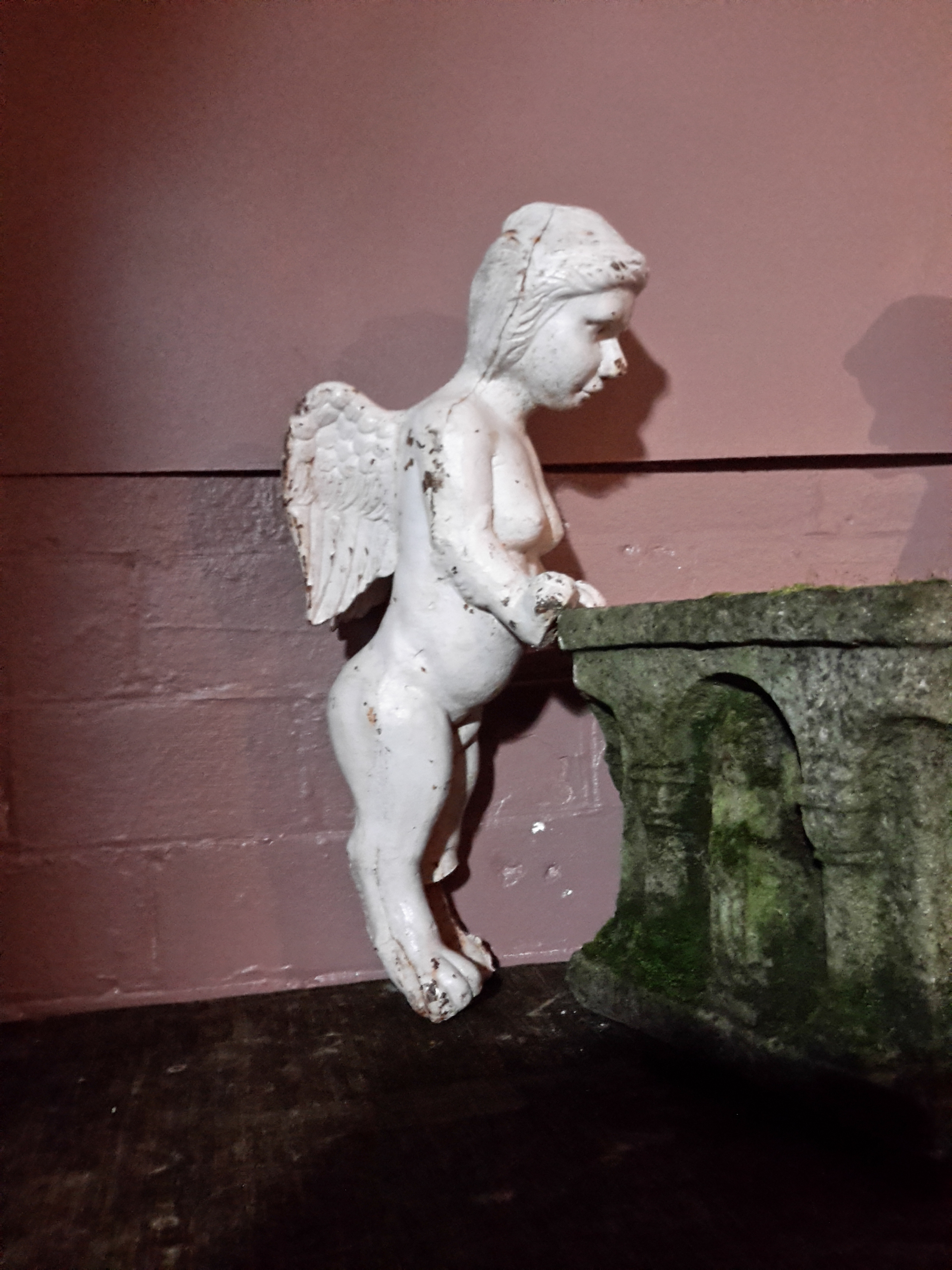 Pair of Victorian painted iron Putti. Winged with detailed form. condition: damage to the front - Image 3 of 3