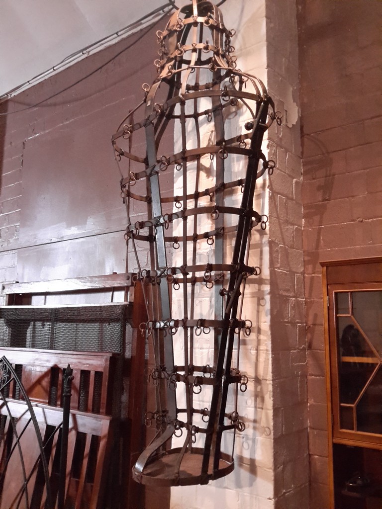 A full size gibbet cage built to contain a person. Originally made as a torture device, or to